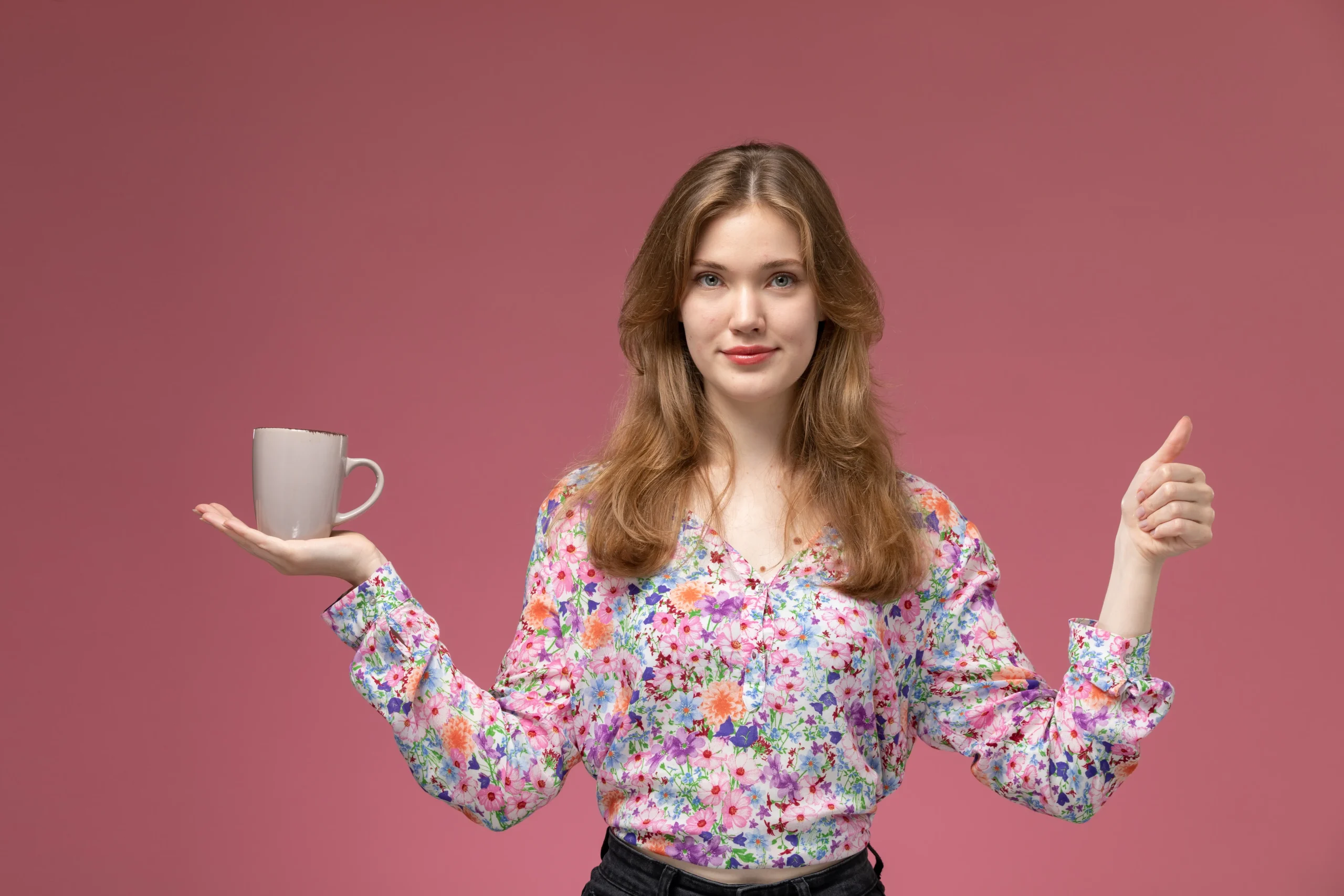 front-view-blonde-woman-shows-thumbs-up-her-cup